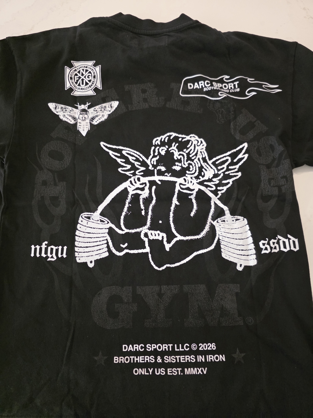 Darc Sport Powrhouse Of The Cherub Black Tee.